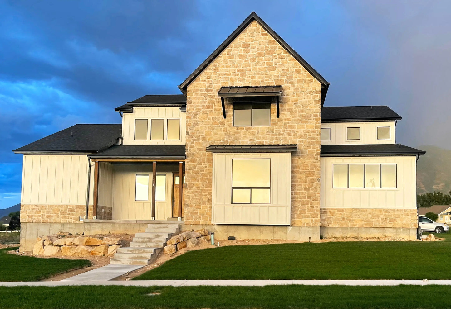photo of a modern farmhouse with stone