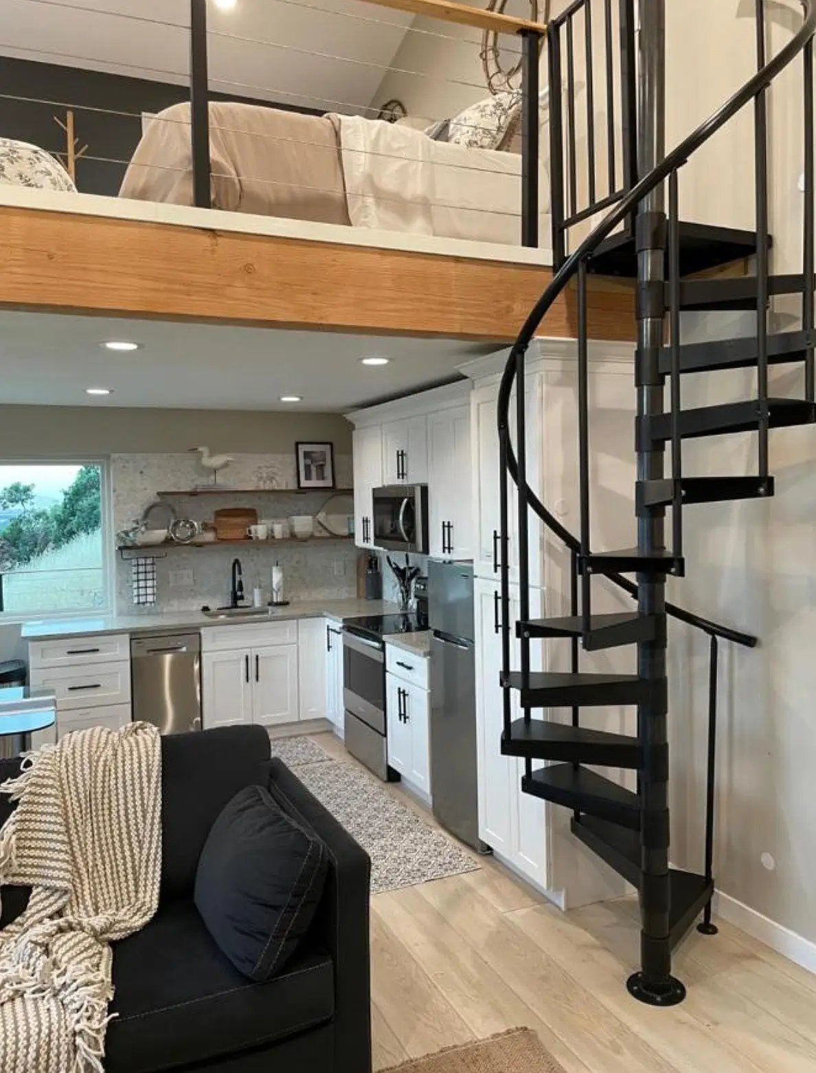photo of loft and circular stairs
