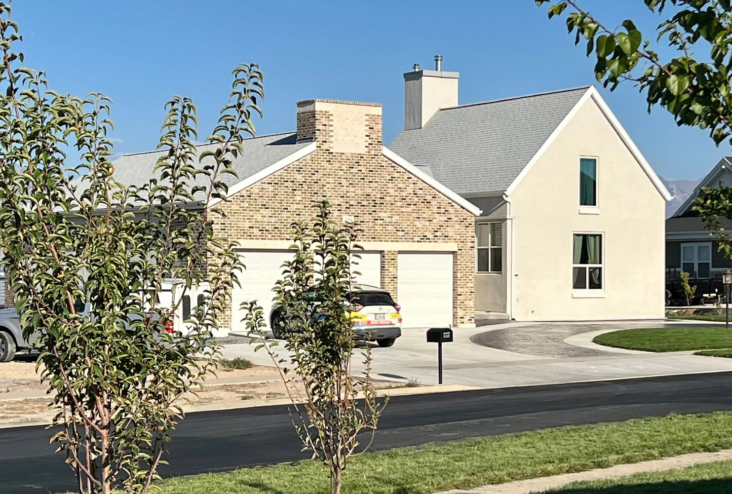 white stucco and brick house