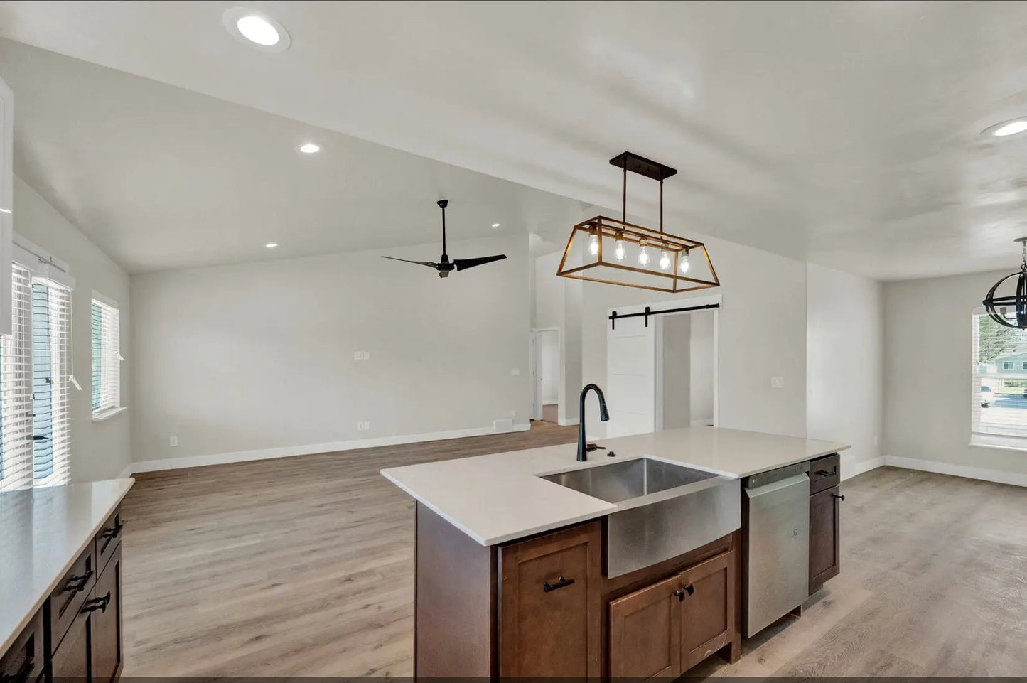 a kitchen with a sink and a window