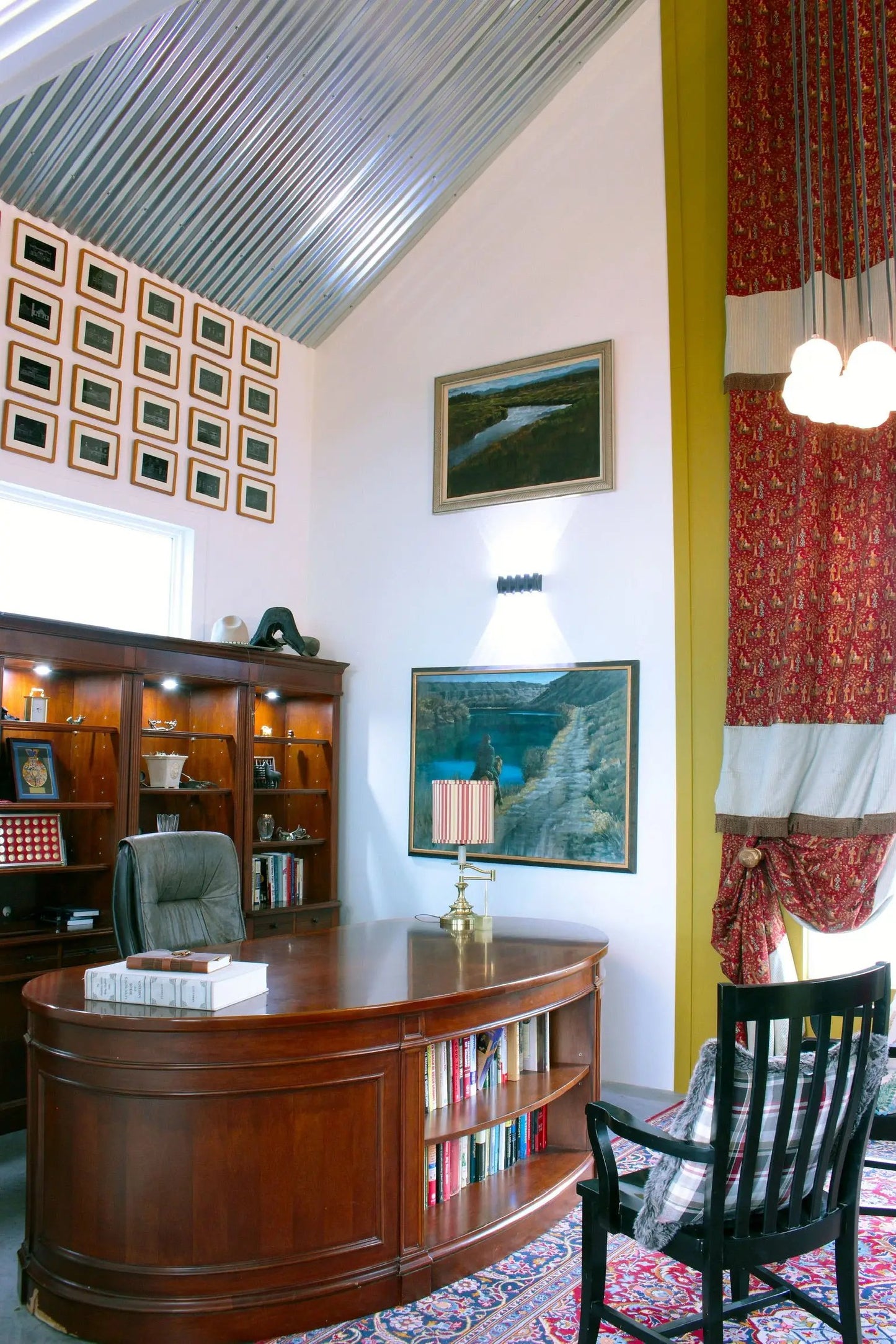 office with metal ceiling and vault