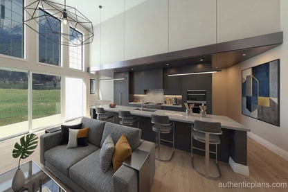 A modern open-plan living and kitchen area in a contemporary apartment, featuring a gray fabric sofa with accent pillows, a kitchen island with three bar stools, dark gray cabinetry, light wood flooring, and large windows overlooking a green lawn.