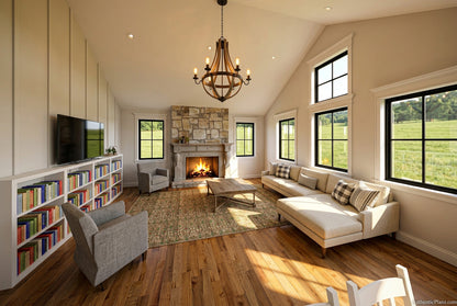 A modern, bright attic living room with a white sectional sofa, gray armchair, bookshelves, a stone fireplace, and large windows looking out onto a green field.