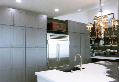 kitchen with tall cabinets